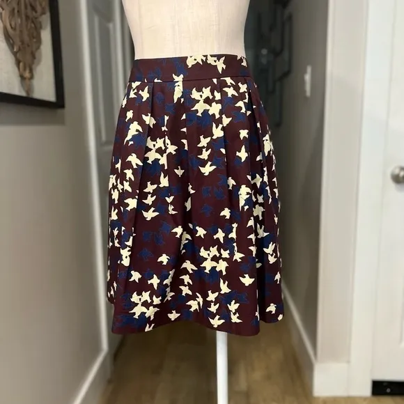 CUE Australia burgundy flock of birds short skirt