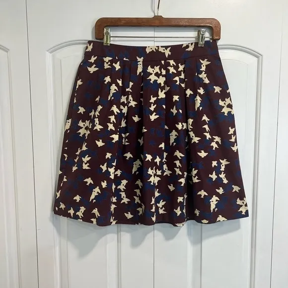 CUE Australia burgundy flock of birds short skirt