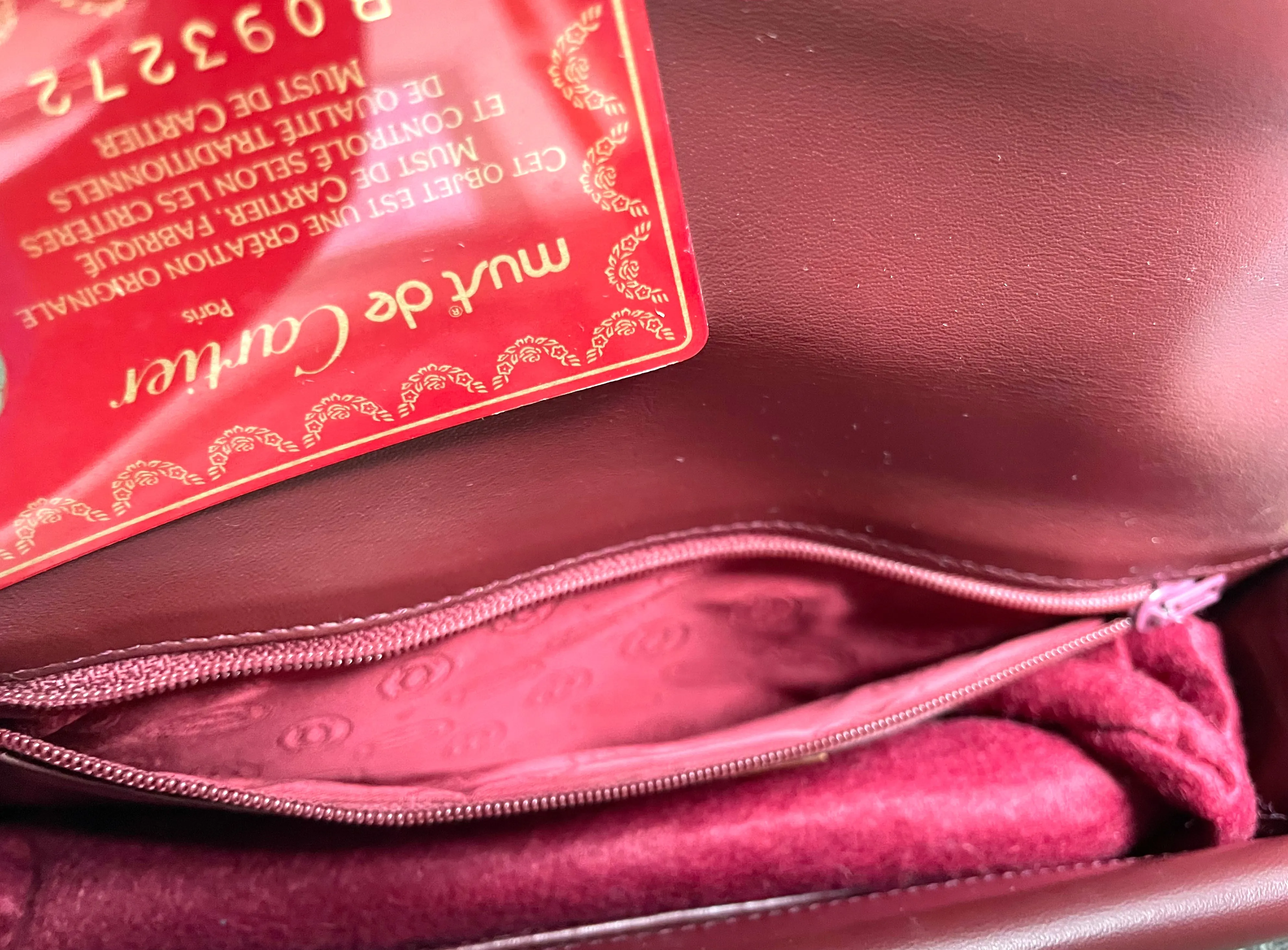 Vintage Cartier double flap envelope shoulder bag with gold-tone logo charm closure and frames. Classic purse from Must de Cartier. 0408172