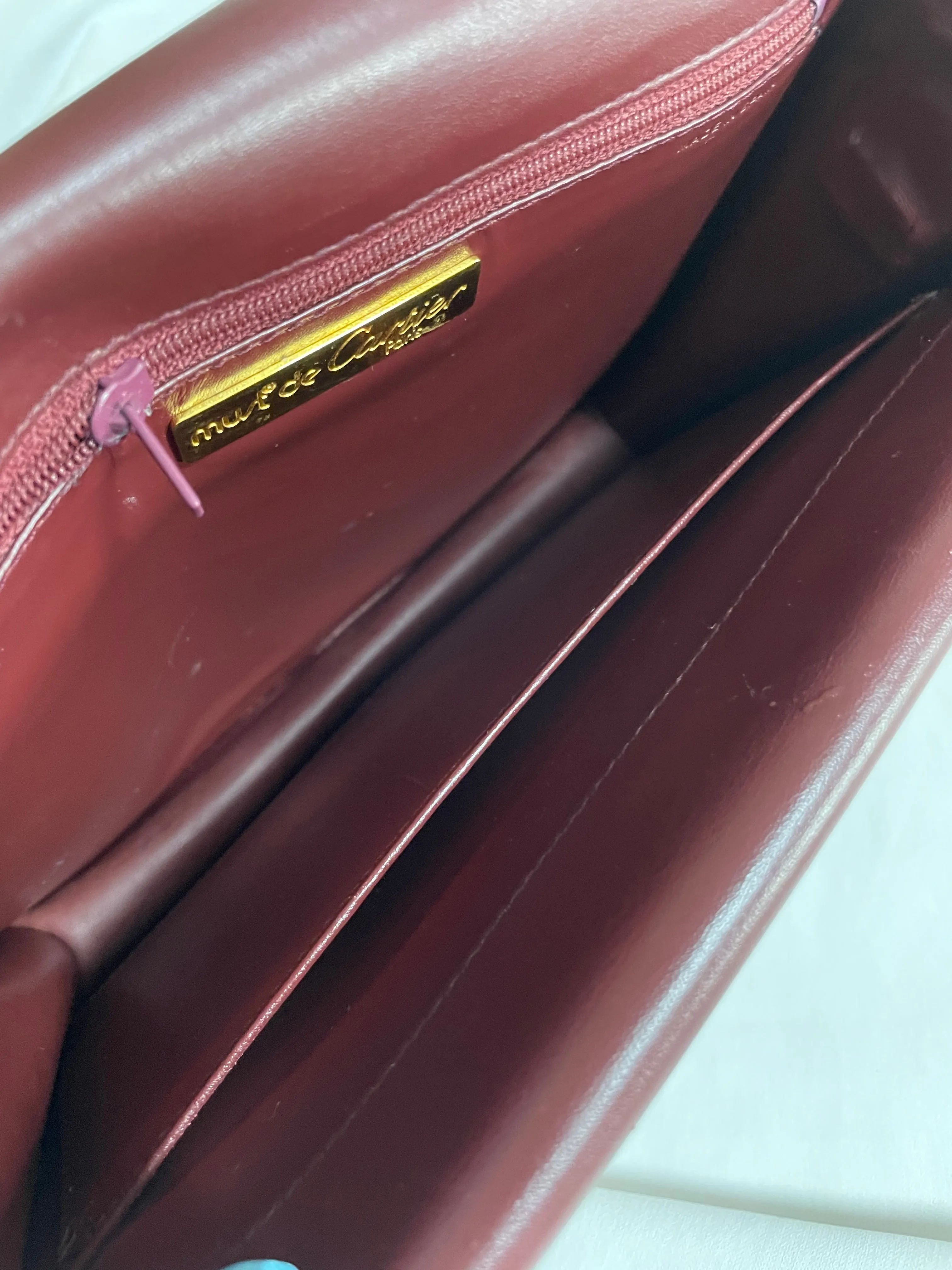 Vintage Cartier double flap envelope shoulder bag with gold-tone logo charm closure and frames. Classic purse from Must de Cartier. 0408172