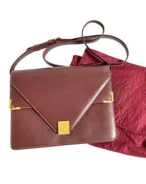 Vintage Cartier double flap envelope shoulder bag with gold-tone logo charm closure and frames. Classic purse from Must de Cartier. 0408172